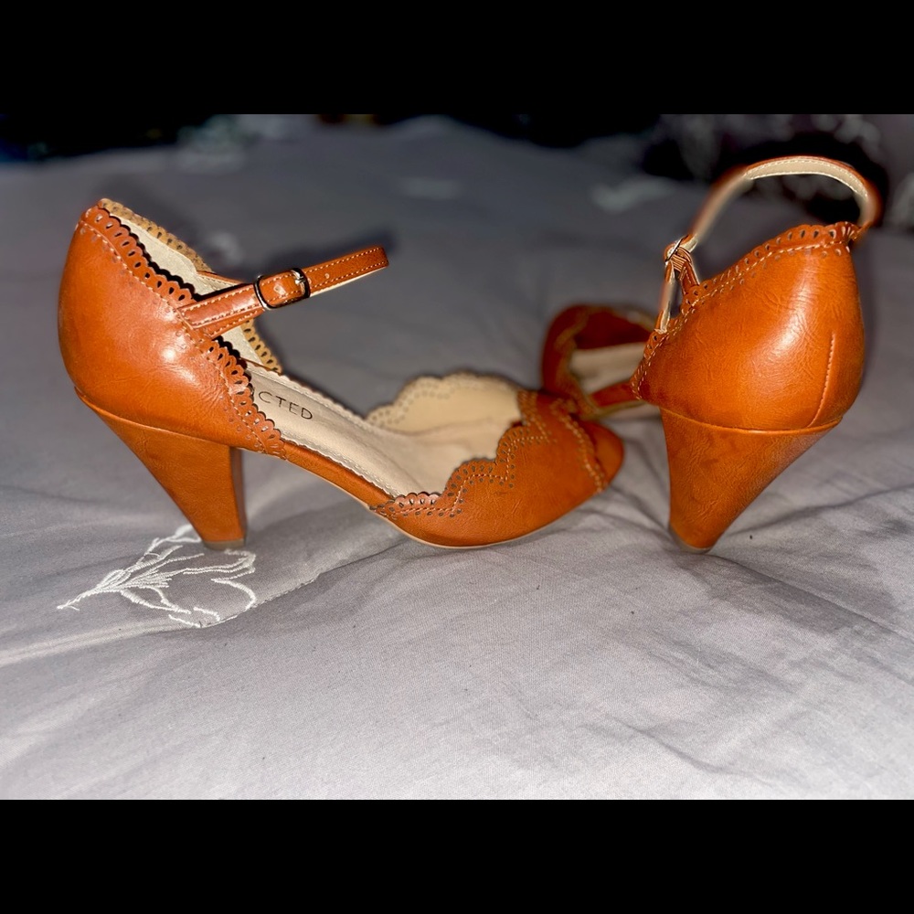 Cute heels that go great with jeans and dresses. Like new. Worn once.